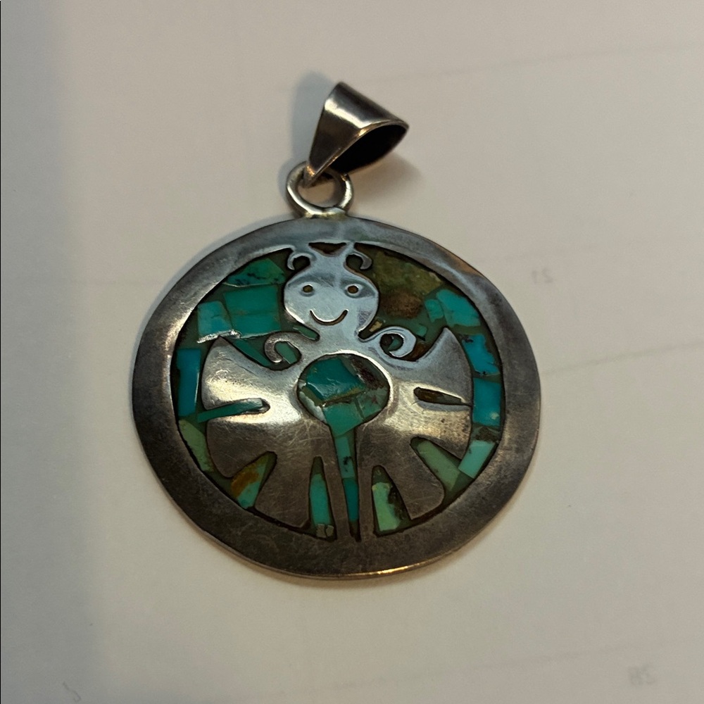 Chic Silver Pendant with Turquoise Inlay